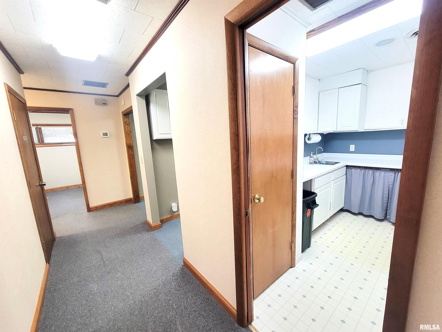 119 West 2nd Street Flora, IL 62839 - Photo 45 of 99 a view of a hallway to rooms