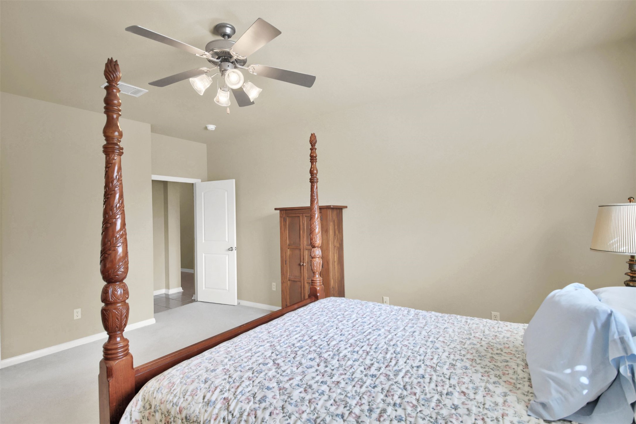 2979 Freemont Street Round Rock, TX 78681 - Photo 26 of 40 Primary Bedroom with carpet floors and ceiling fan