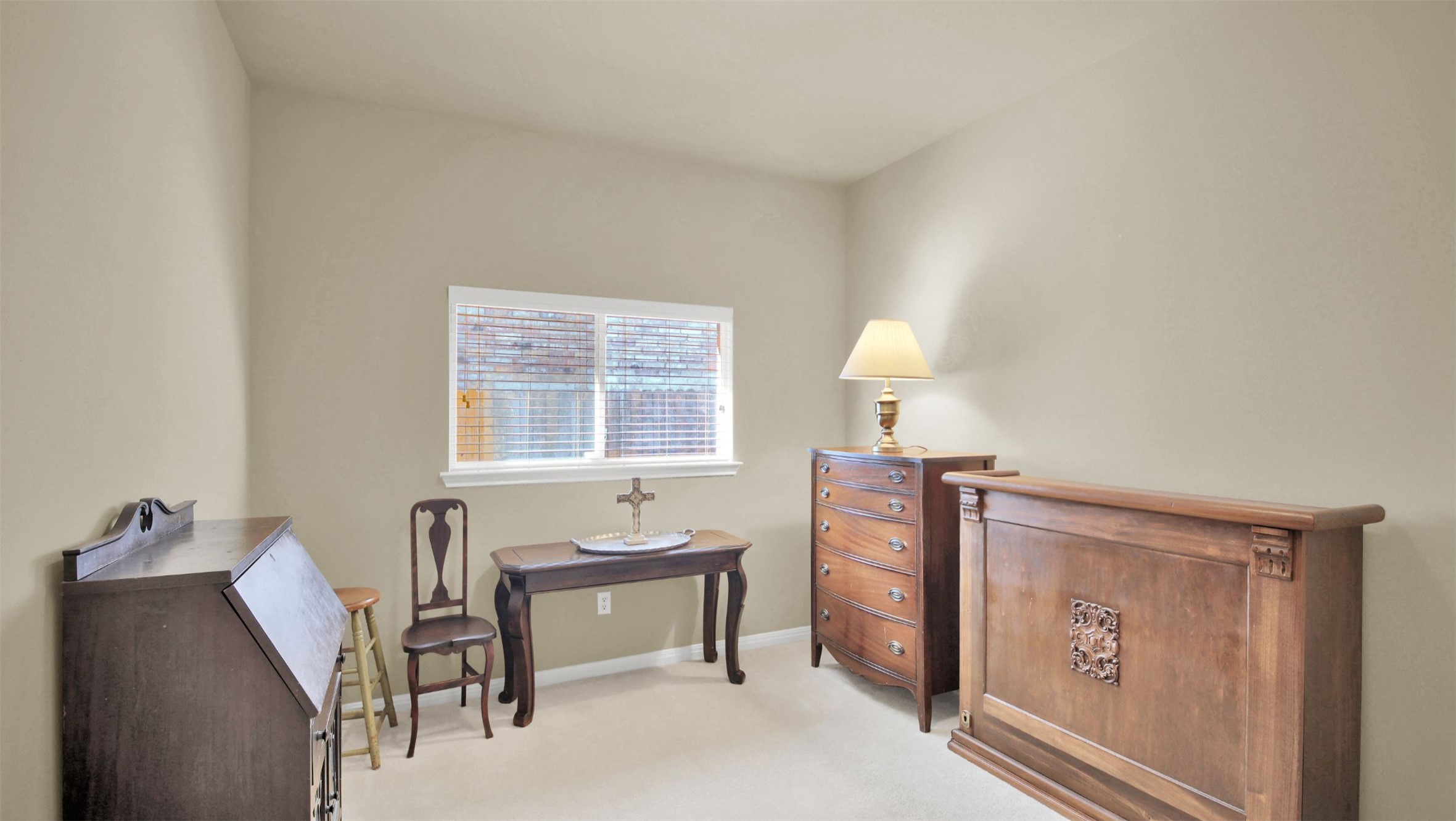2979 Freemont Street Round Rock, TX 78681 - Photo 31 of 40 Living area featuring light colored carpet and baseboards