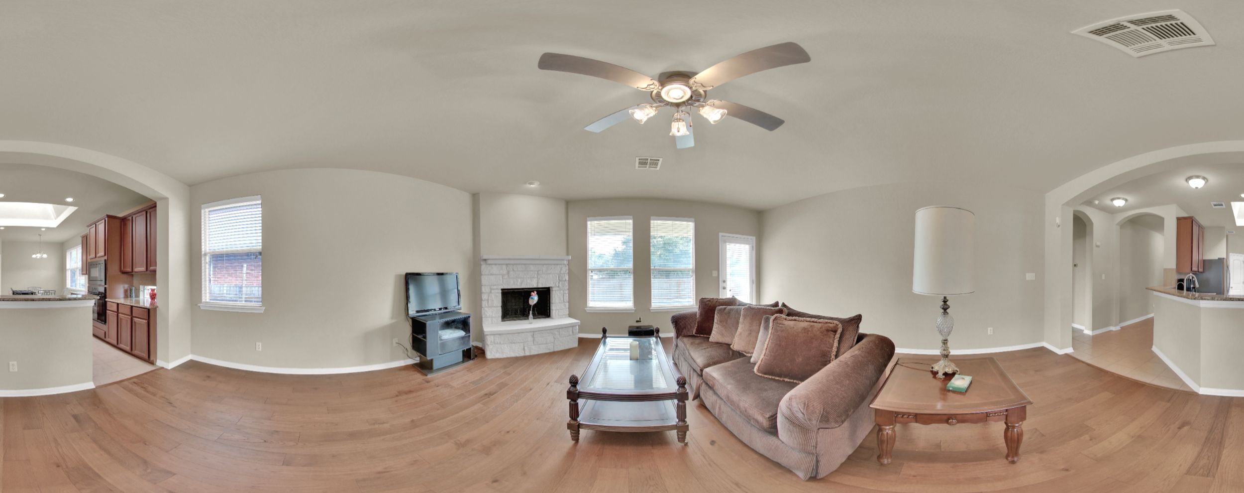 2979 Freemont Street Round Rock, TX 78681 - Photo 39 of 40 Living area featuring arched walkways, ceiling fan, light wood-style floors, and a barrel ceiling