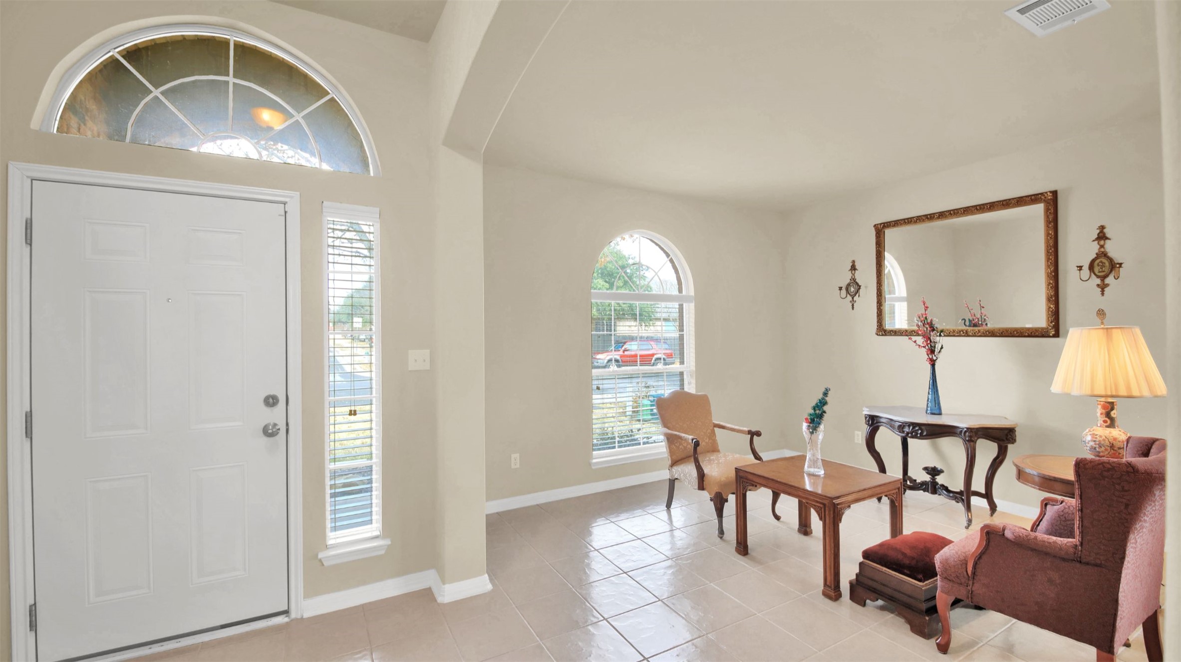 2979 Freemont Street Round Rock, TX 78681 - Photo 6 of 40 Entrance foyer featuring light tile patterned flooring and baseboards
