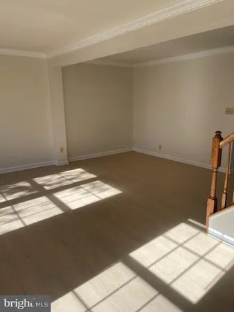 a view of a big room with wooden floor
