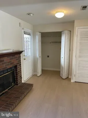a view of a livingroom with a fireplace