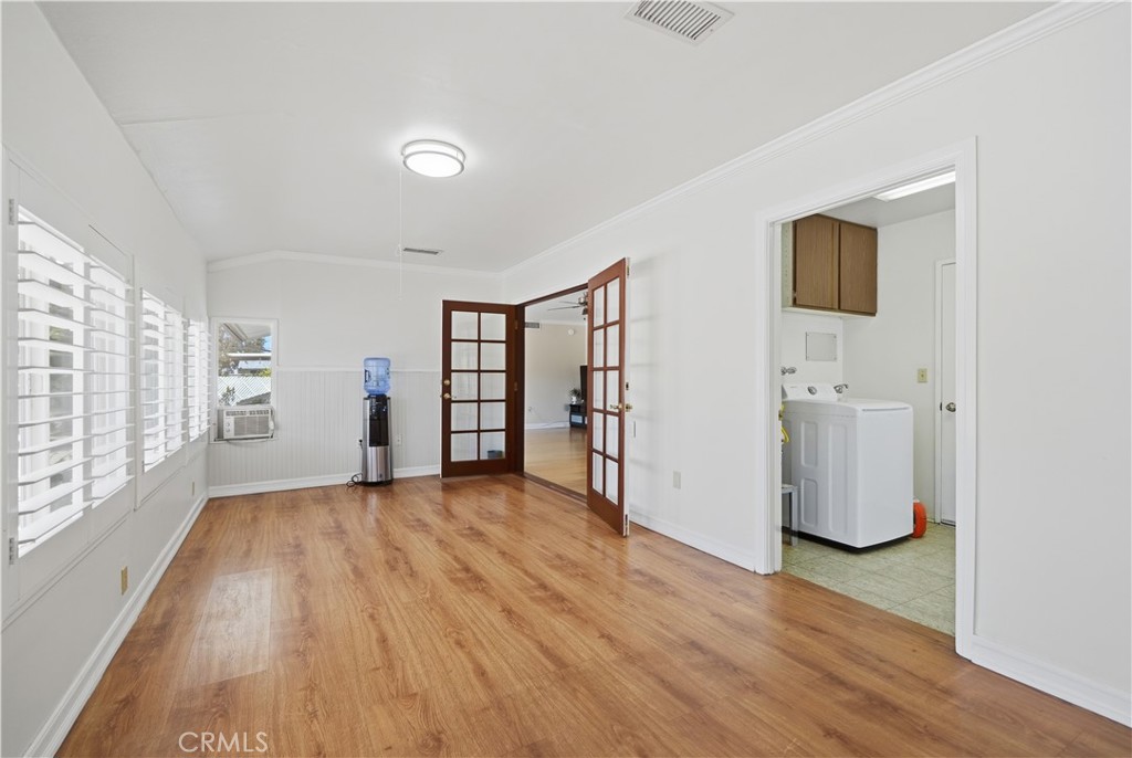 26500 New Bedford Road Menifee, CA 92586 - Photo 17 of 47 wooden floor in an empty room with a window