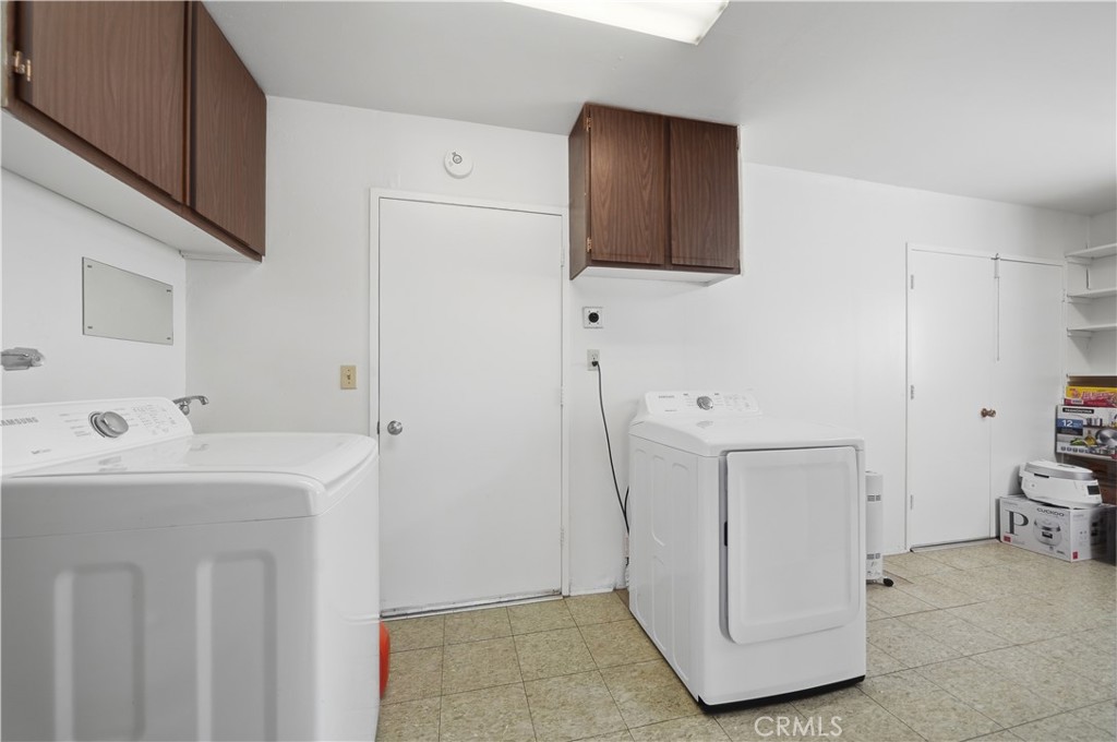 26500 New Bedford Road Menifee, CA 92586 - Photo 19 of 47 a bathroom with a sink a toilet and mirror