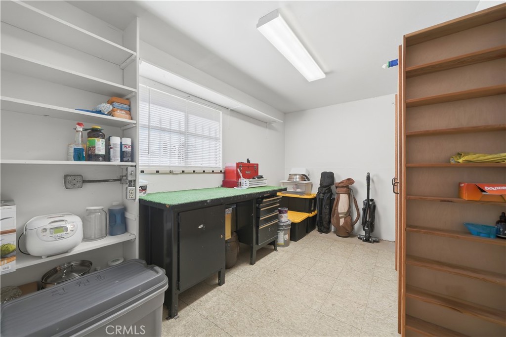 26500 New Bedford Road Menifee, CA 92586 - Photo 20 of 47 a room with a desk and chair