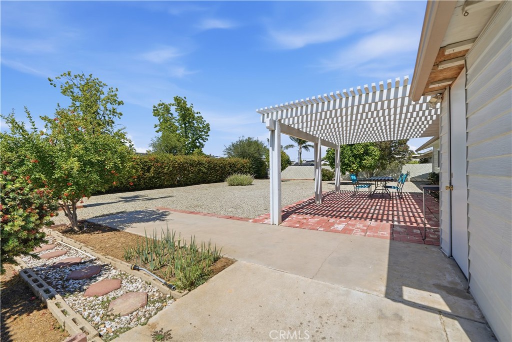 26500 New Bedford Road Menifee, CA 92586 - Photo 29 of 47 a balcony with view of garden space