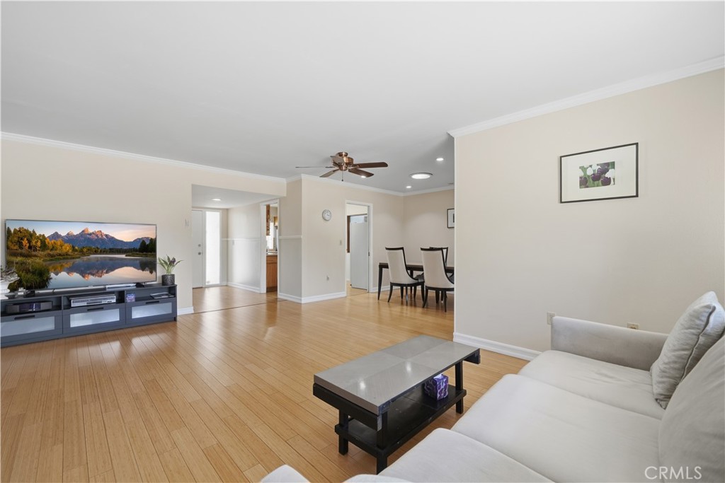 26500 New Bedford Road Menifee, CA 92586 - Photo 7 of 47 a living room with furniture and wooden floor