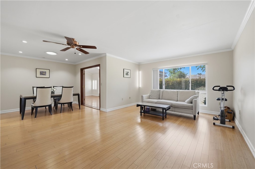26500 New Bedford Road Menifee, CA 92586 - Photo 8 of 47 a living room with furniture and wooden floor
