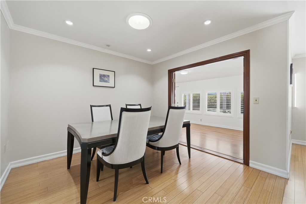 26500 New Bedford Road Menifee, CA 92586 - Photo 10 of 47 a workspace room with furniture and wooden floor