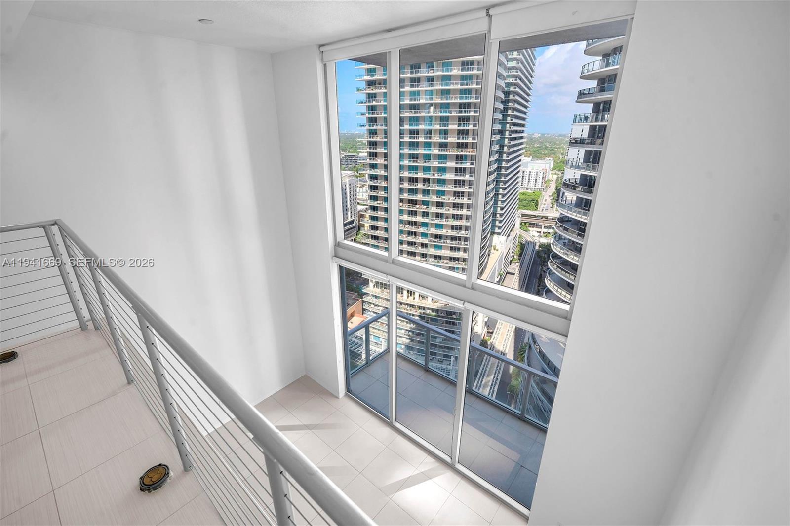 1050 Brickell Avenue, Unit 2418 Miami, FL 33131 - Photo 15 of 25 a view of balcony and window