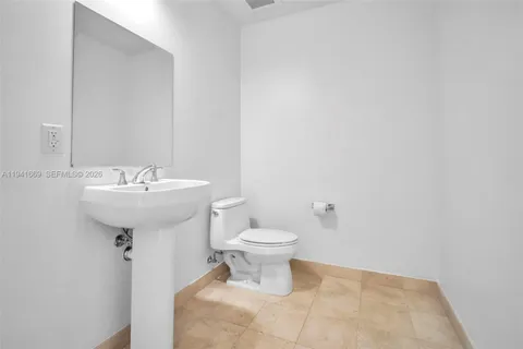 a view of swimming pool with outdoor seating and plants