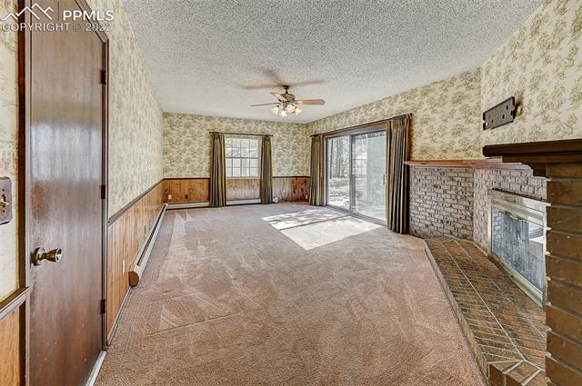 11020 Hungate Road Colorado Springs, CO 80908 - Photo 12 of 42 family room main