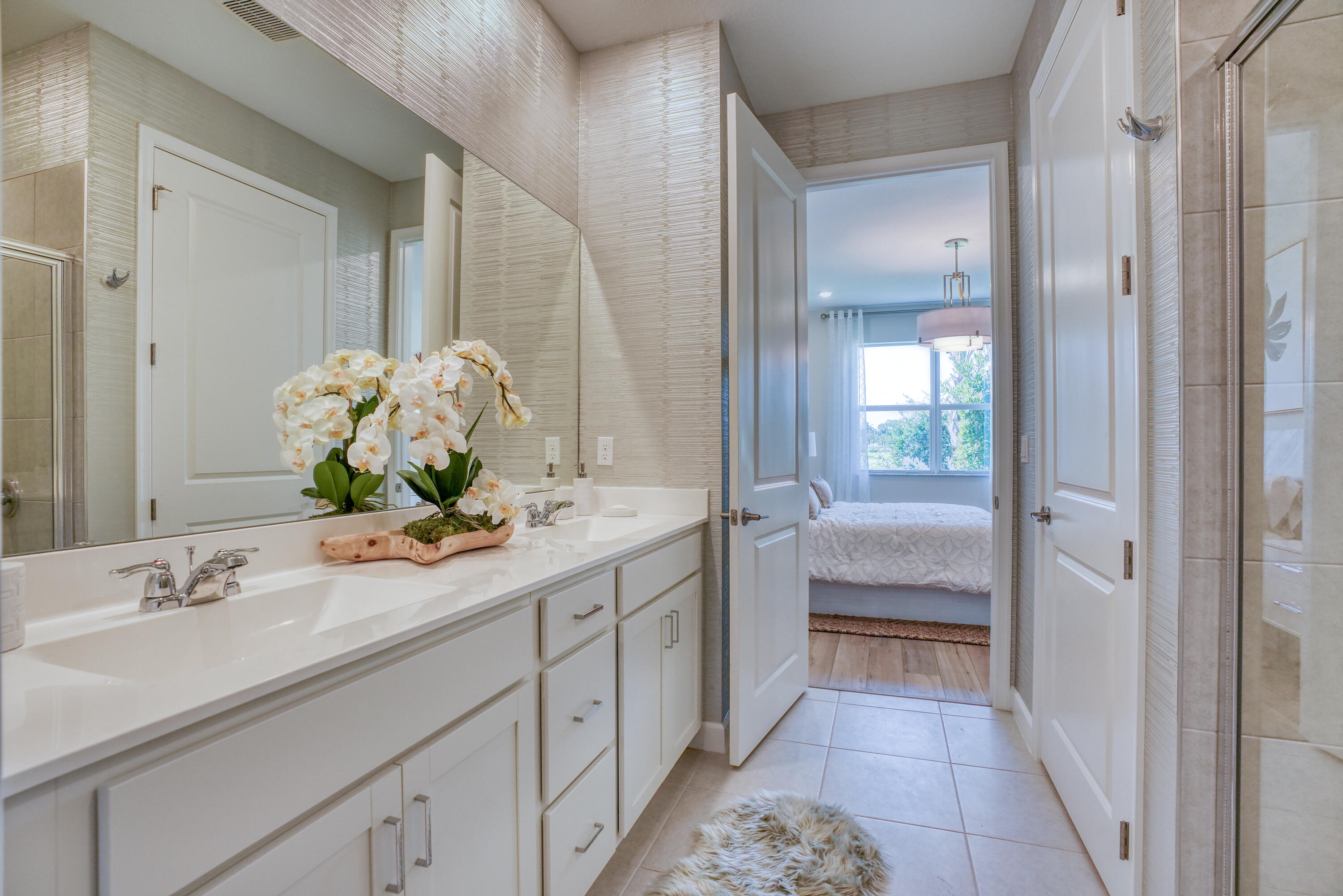 13659 Hero Path Delray Beach, FL 33484 - Photo 9 of 13 a bathroom with a sink and a mirror