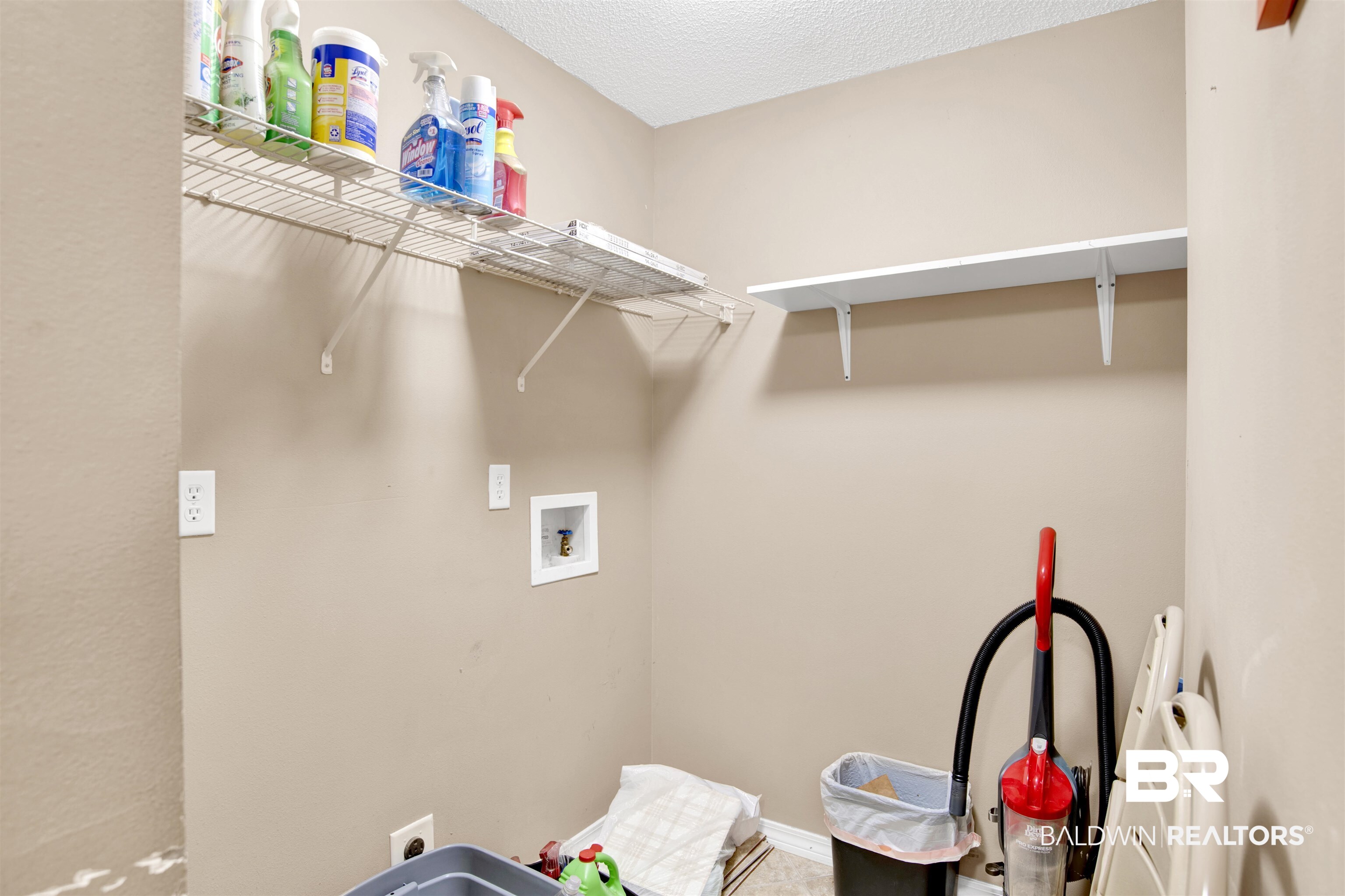 7297 Bridgemill Drive Mobile, AL 36619 - Photo 25 of 33 Washroom with a textured ceiling and washer hookup