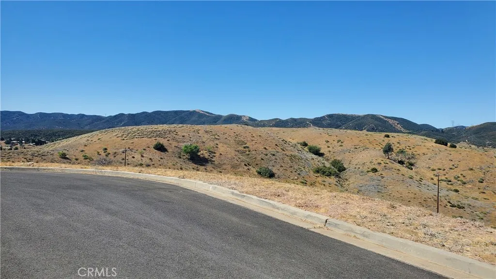 0 McCloud Drive Lake Elizabeth, CA 93532 - Photo 8 of 15 a view of a large mountain with mountains in the background