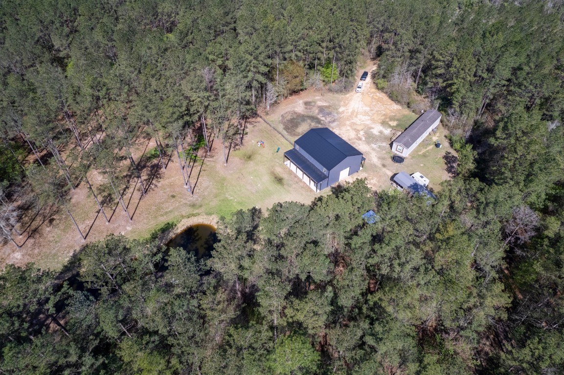 an aerial view of residential house with outdoor space