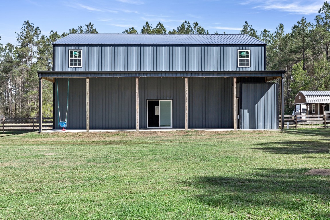 4943 Fm 770 Road Kountze, TX 77625 - Photo 3 of 15 a view of a house with a garden