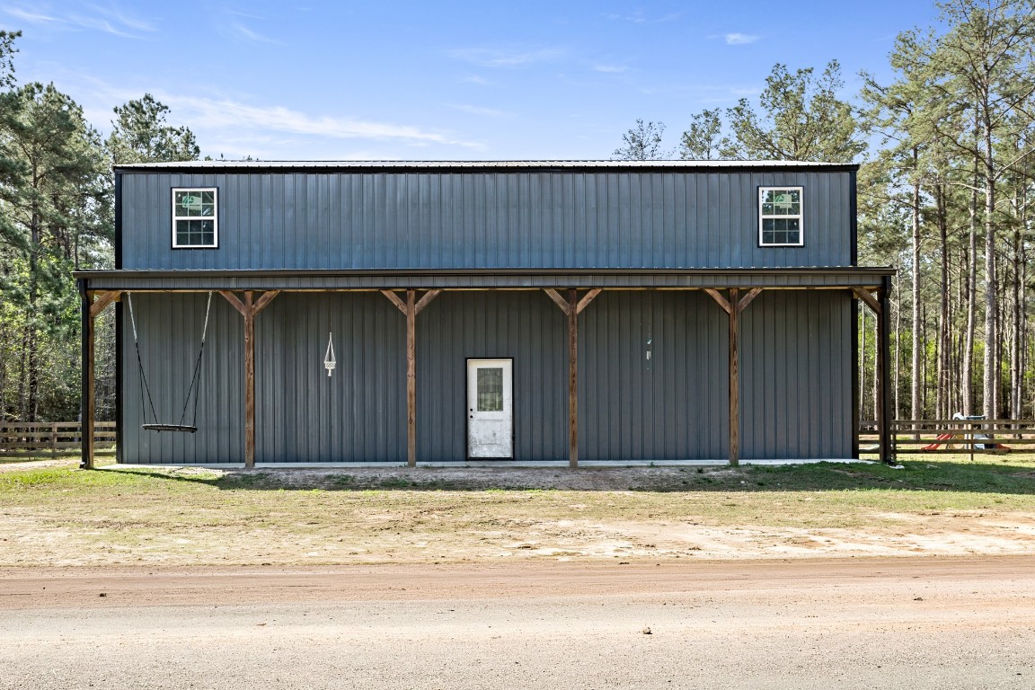4943 Fm 770 Road Kountze, TX 77625 - Photo 5 of 15 a house with a outdoor space