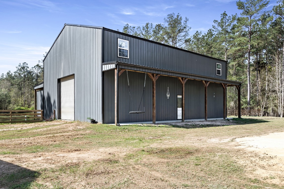 4943 Fm 770 Road Kountze, TX 77625 - Photo 6 of 15 a house with trees in the background