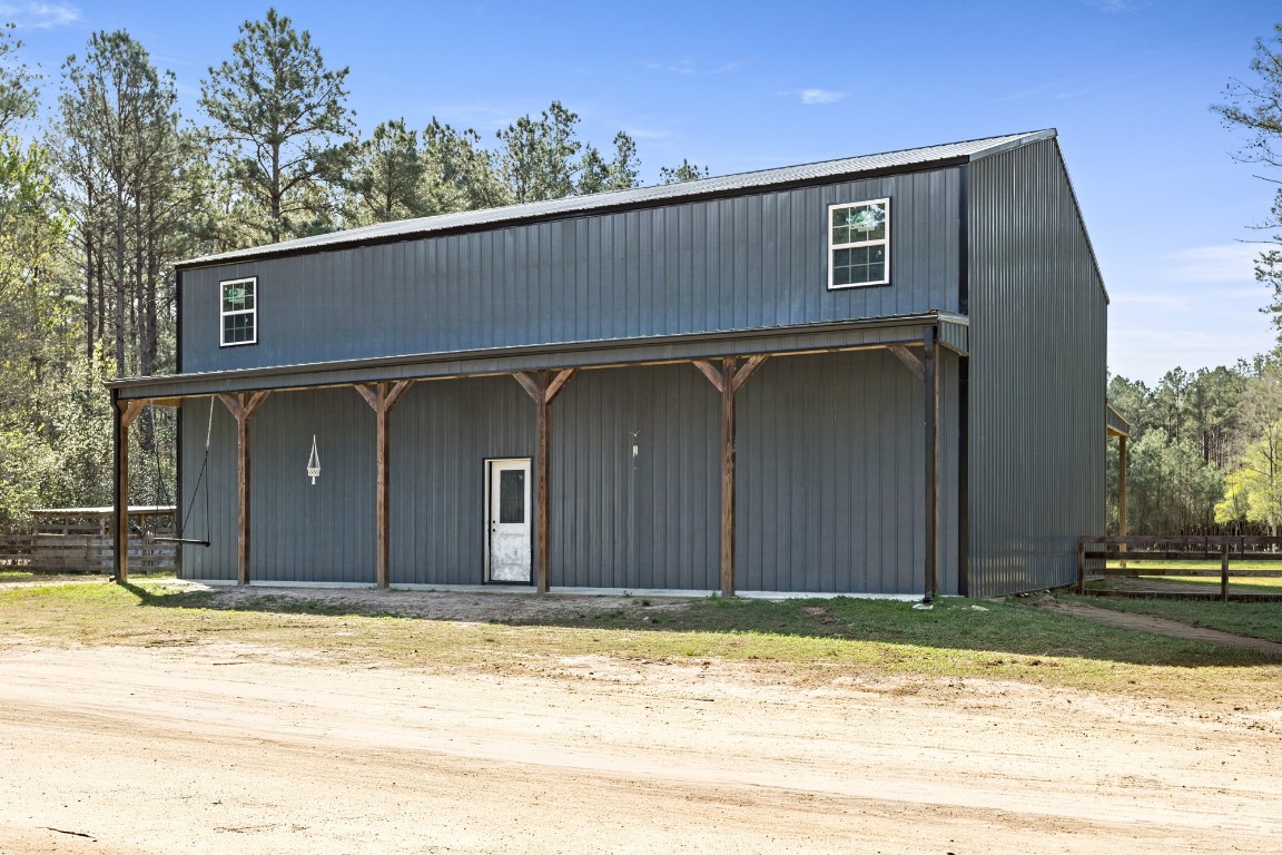4943 Fm 770 Road Kountze, TX 77625 - Photo 7 of 15 a house with a outdoor space