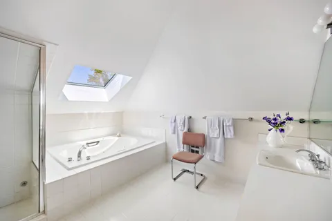 a view of house with outdoor seating space