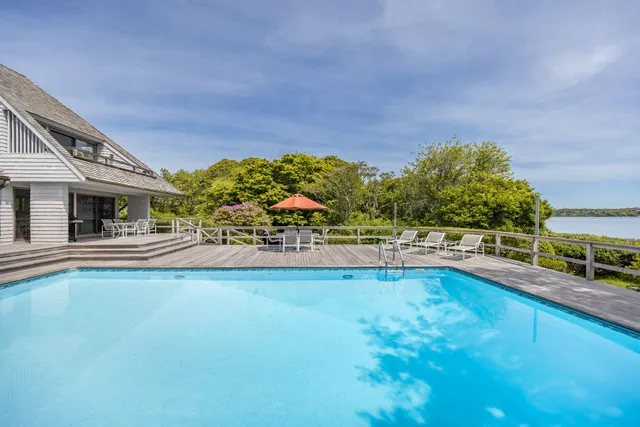 a view of yard with swimming pool