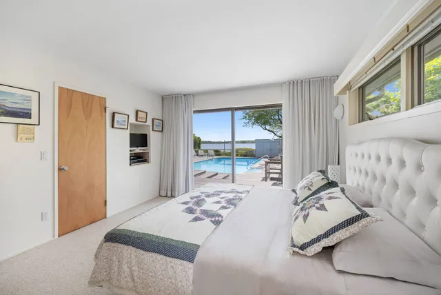 a bathroom with a bathtub and a sink