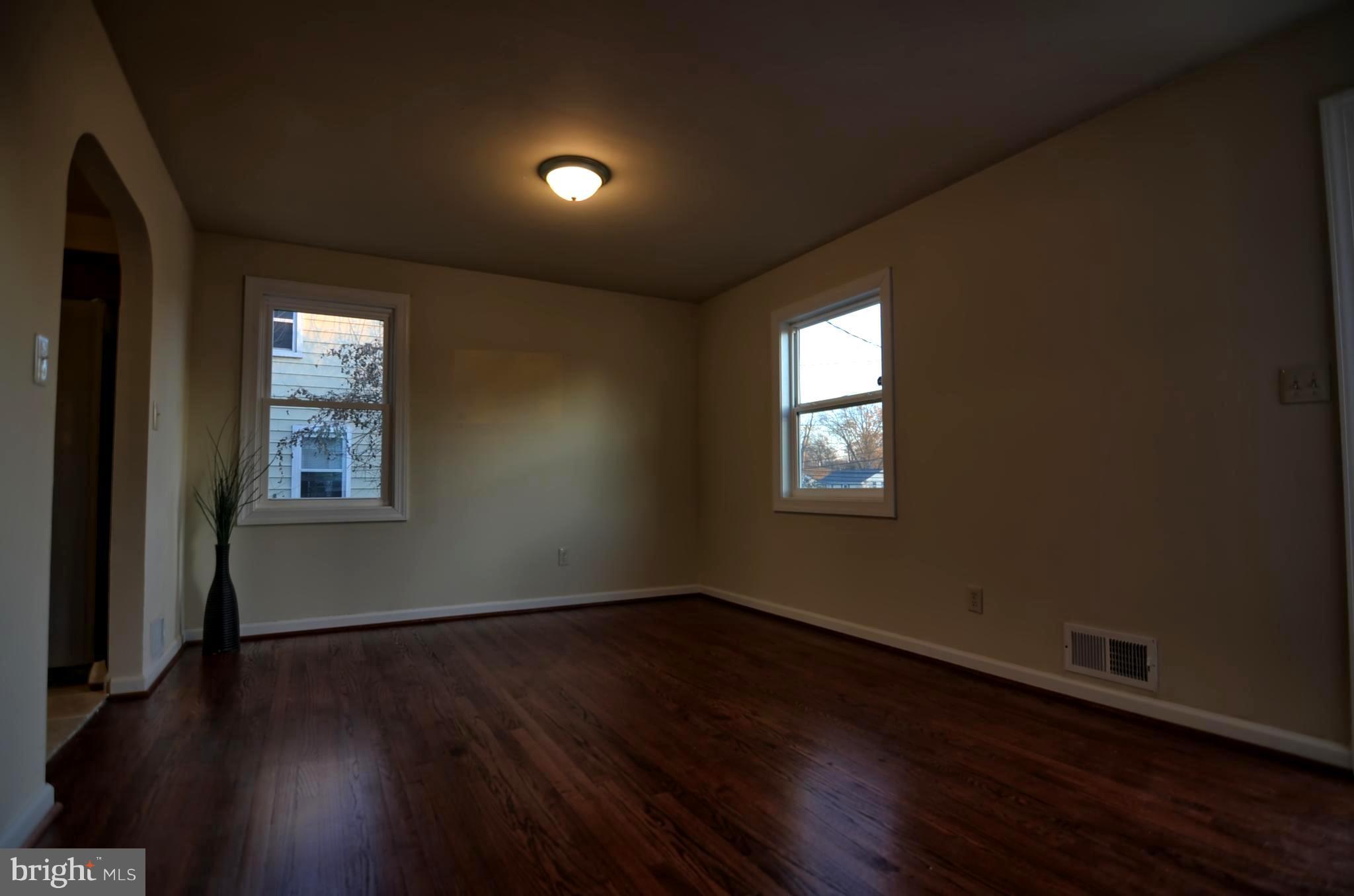 2603 Randolph Road Silver Spring, MD 20902 - Photo 13 of 26 a view of an empty room with wooden floor and a window