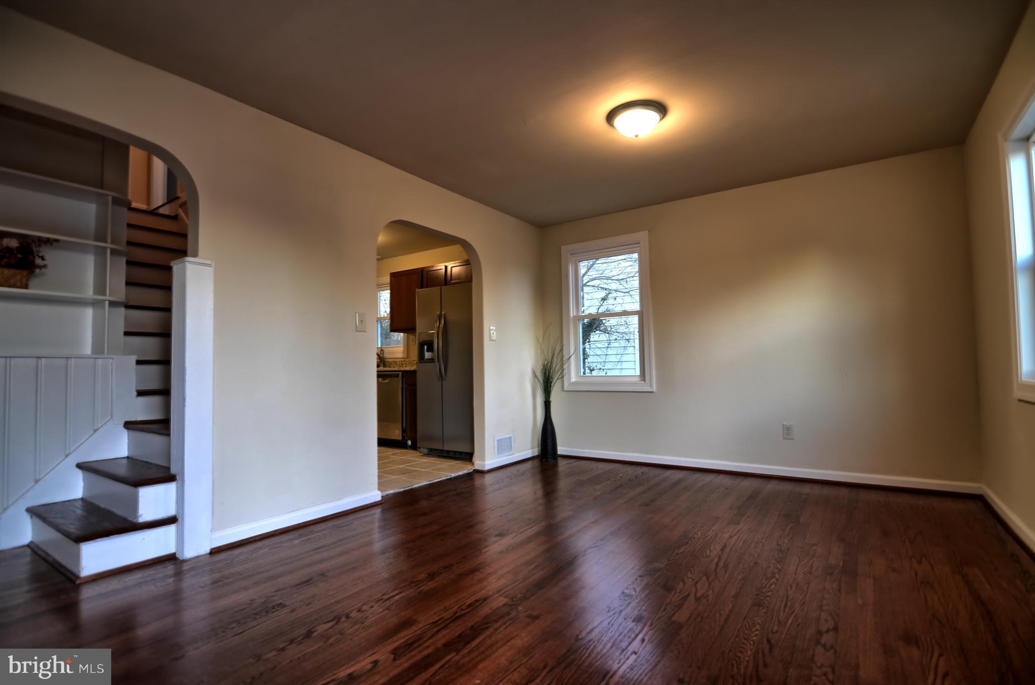 2603 Randolph Road Silver Spring, MD 20902 - Photo 14 of 26 a view of an empty room with wooden floor and a window