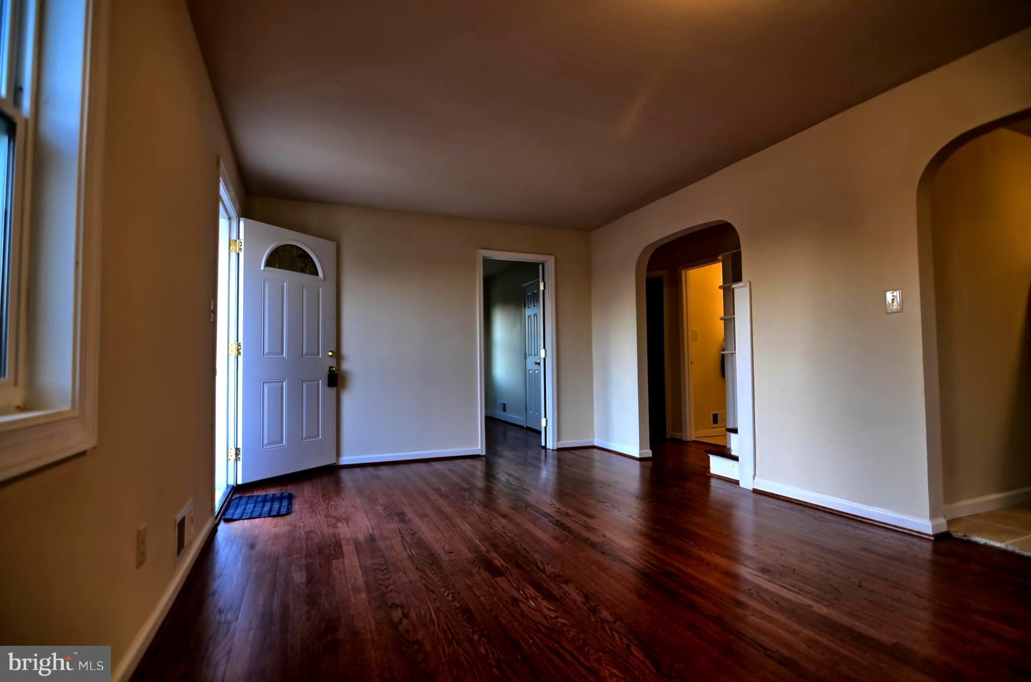 2603 Randolph Road Silver Spring, MD 20902 - Photo 15 of 26 a view of an empty room with wooden floor and a window