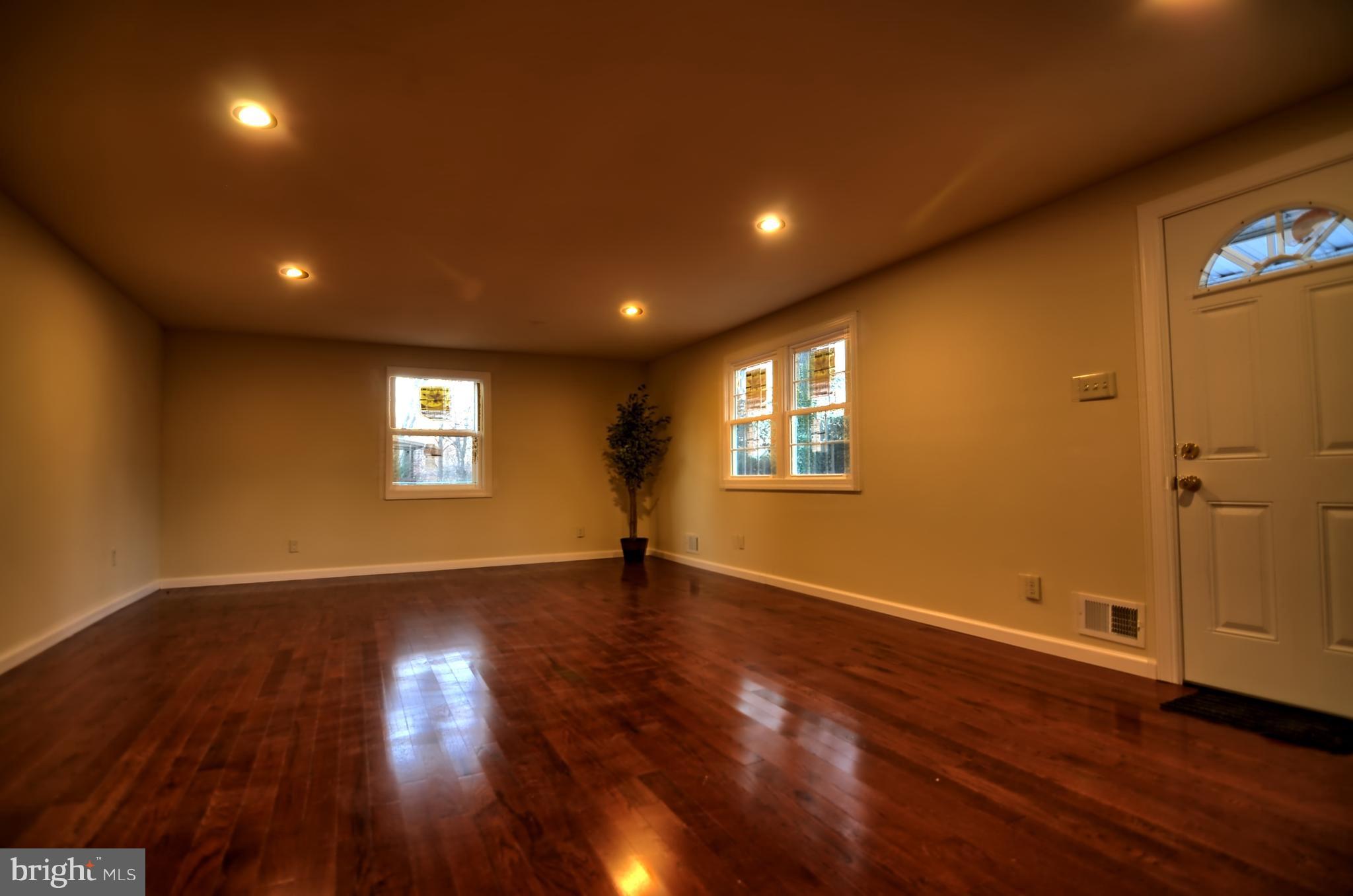 2603 Randolph Road Silver Spring, MD 20902 - Photo 16 of 26 an empty room with wooden floor and windows