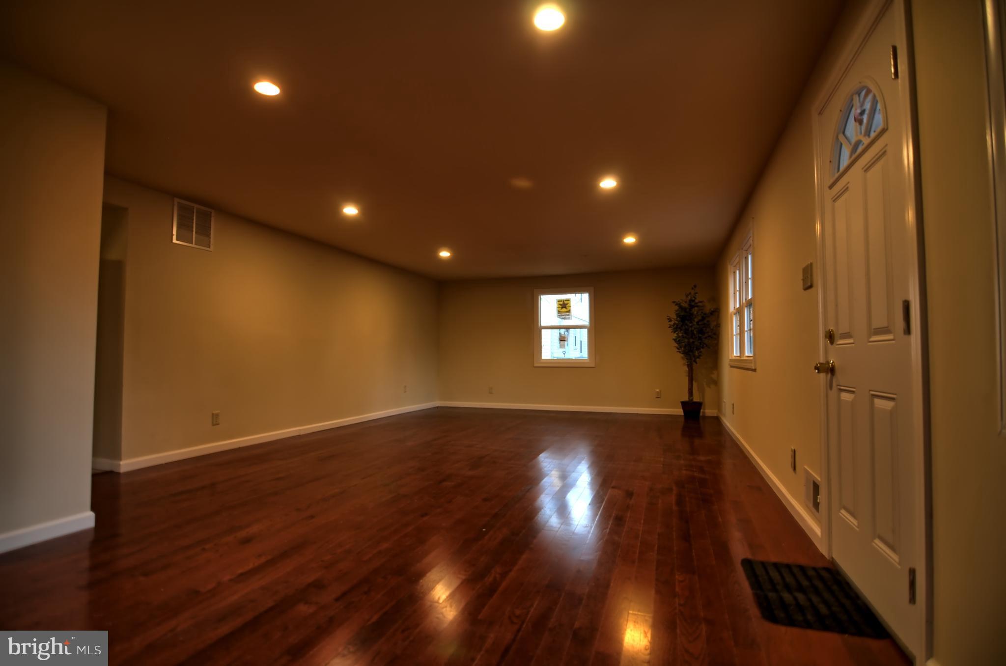 2603 Randolph Road Silver Spring, MD 20902 - Photo 17 of 26 a view of empty room with wooden floor and fan