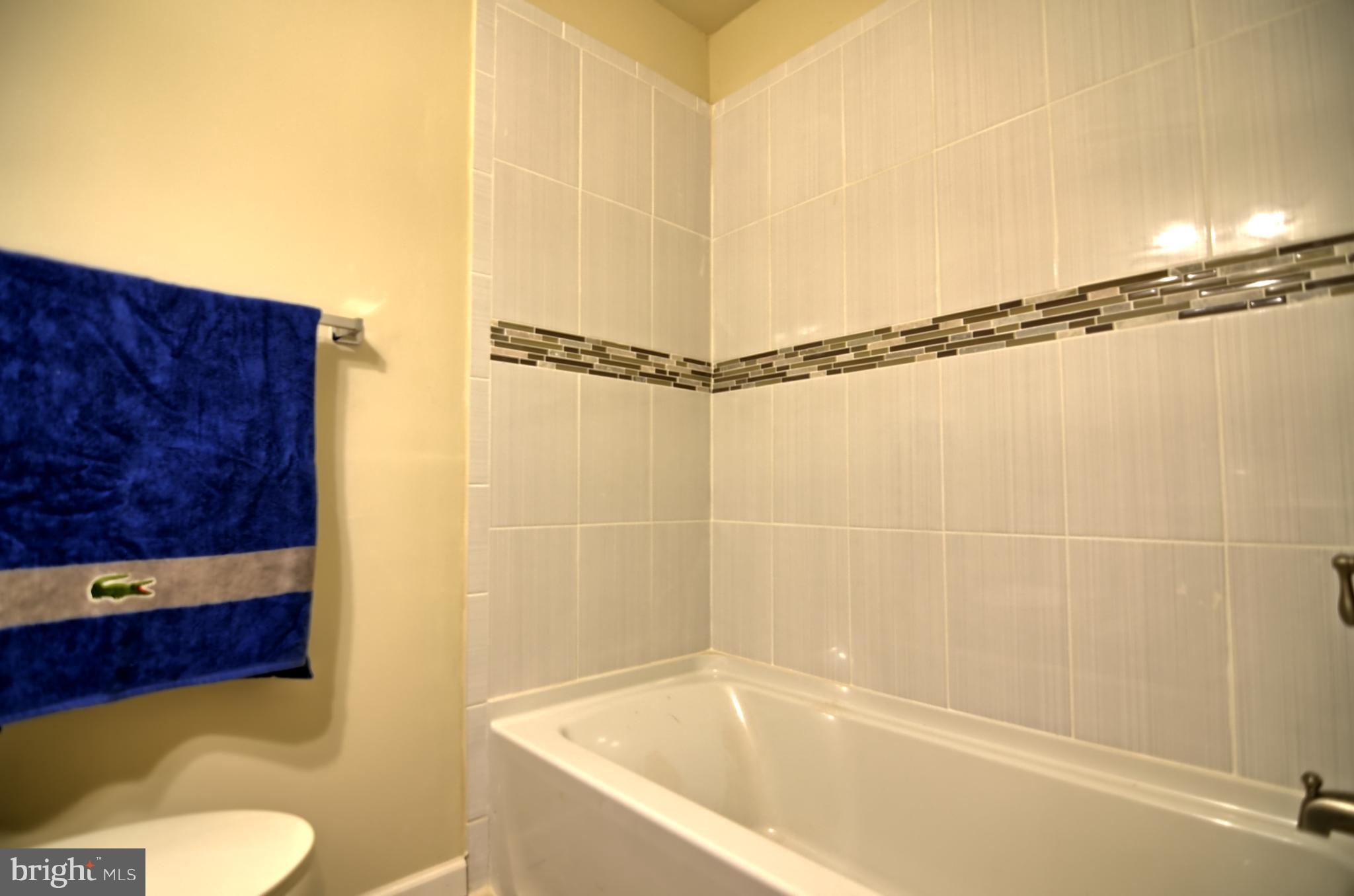 2603 Randolph Road Silver Spring, MD 20902 - Photo 7 of 26 a bathroom with a bathtub and shower