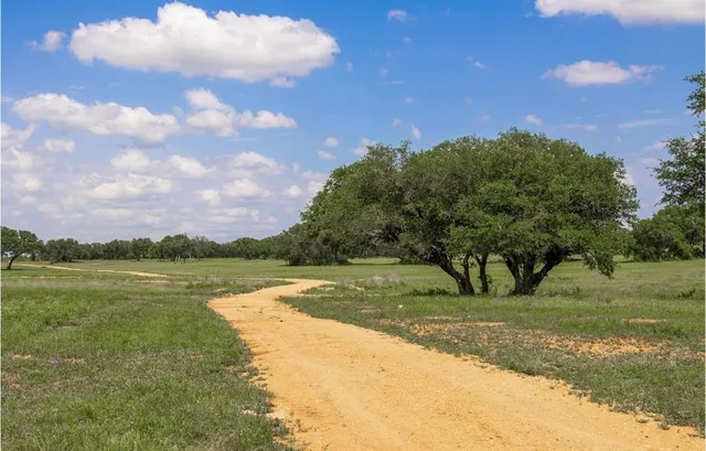 a view of lake with green space