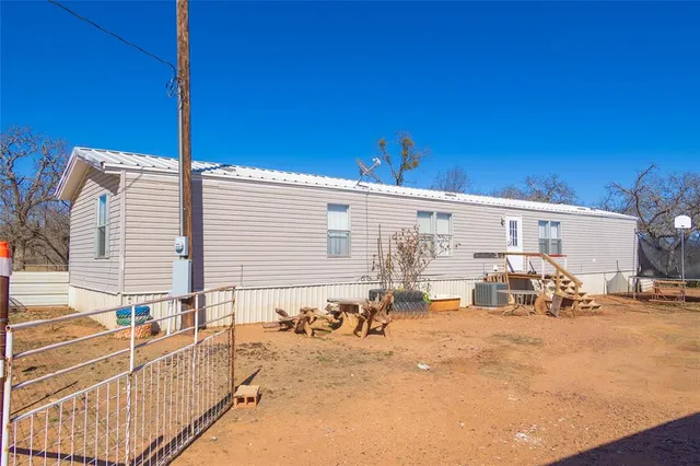 a view of a terrace with a barbeque