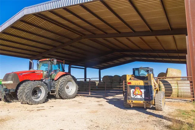 a front view of a house with parking space
