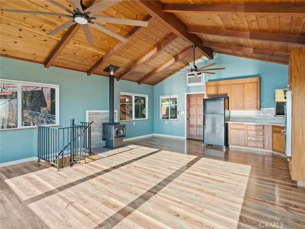 a outdoor space with pool table and chandelier