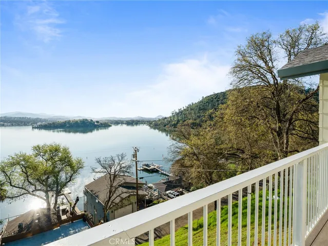 a view of a lake from a balcony