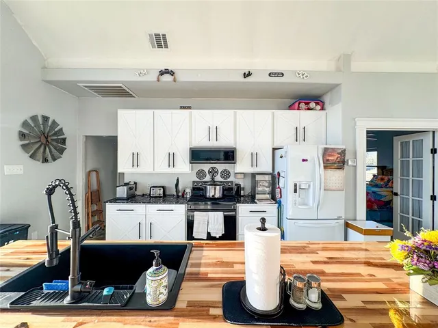 a view of a ocean with outside seating