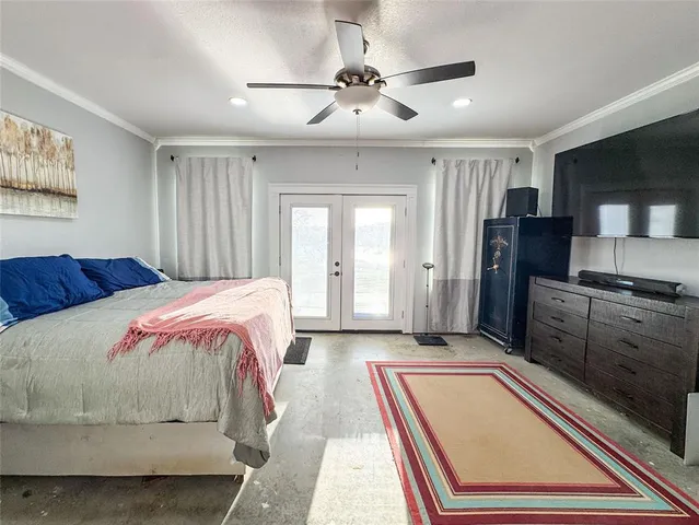 a view of a street with wooden fence