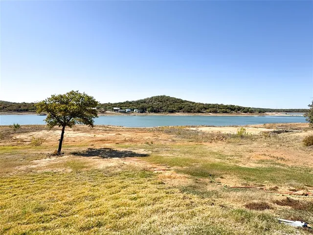 a bedroom with a bed and furniture