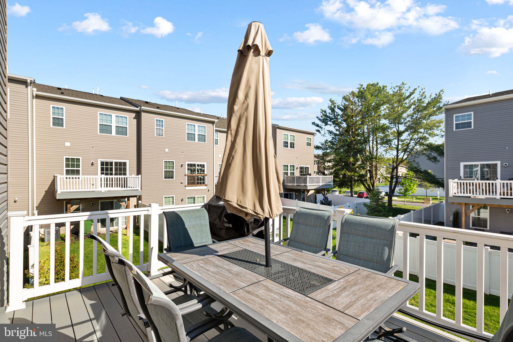 145 Meridian Lane Sewell, NJ 08080 - Photo 15 of 15 a view of a patio with a table chairs and barbeque grill