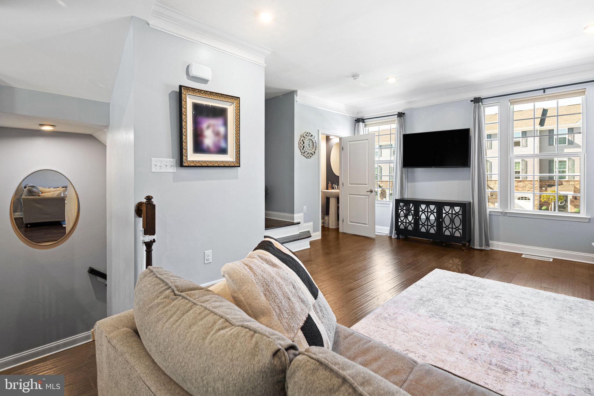 145 Meridian Lane Sewell, NJ 08080 - Photo 5 of 15 a living room with furniture and a flat screen tv