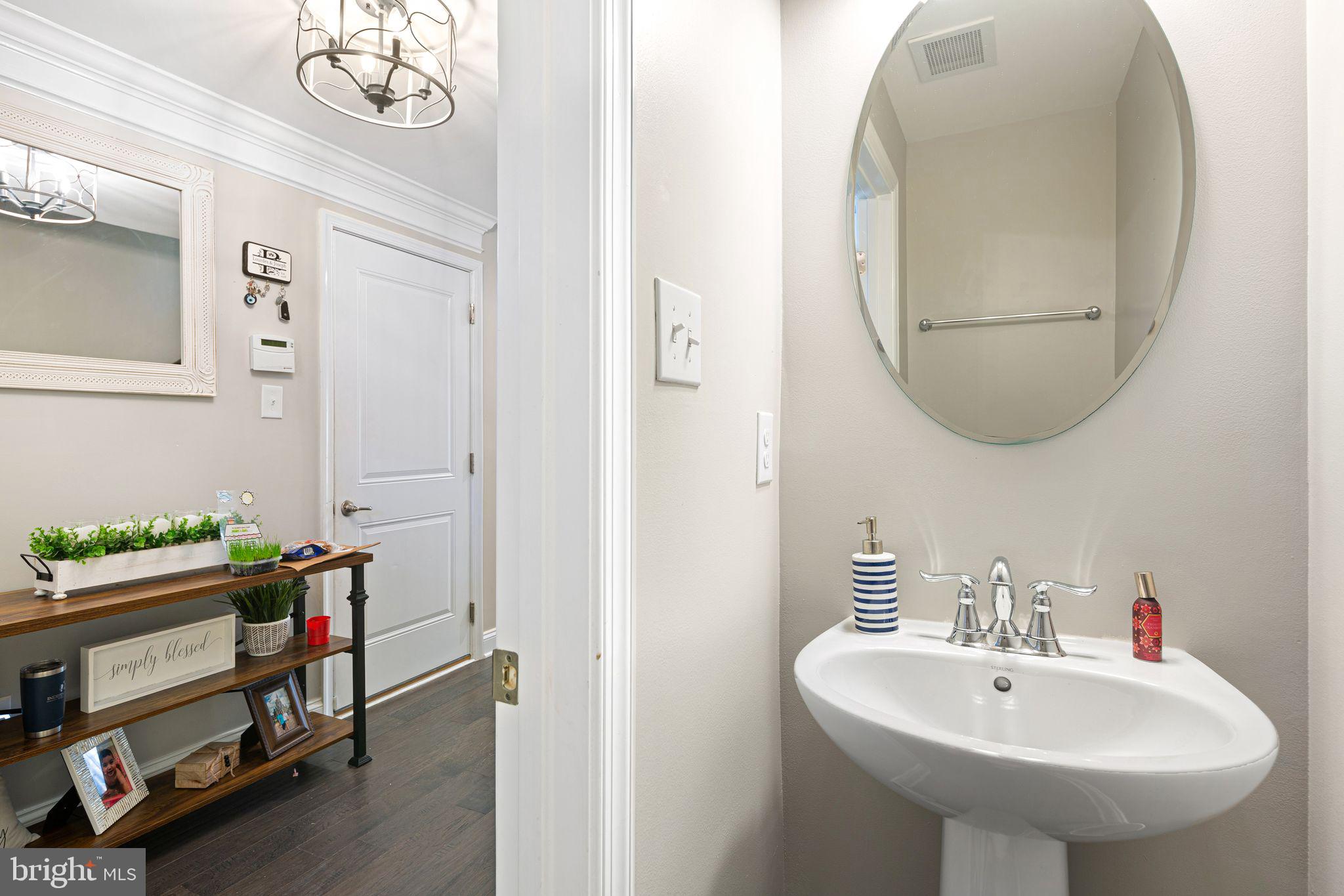 145 Meridian Lane Sewell, NJ 08080 - Photo 6 of 15 a bathroom with a sink and a mirror