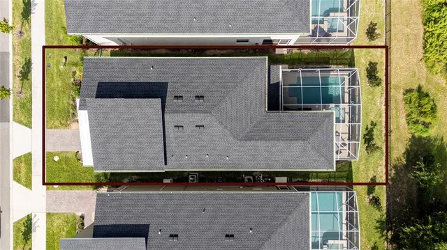 a view of a swimming pool with a porch