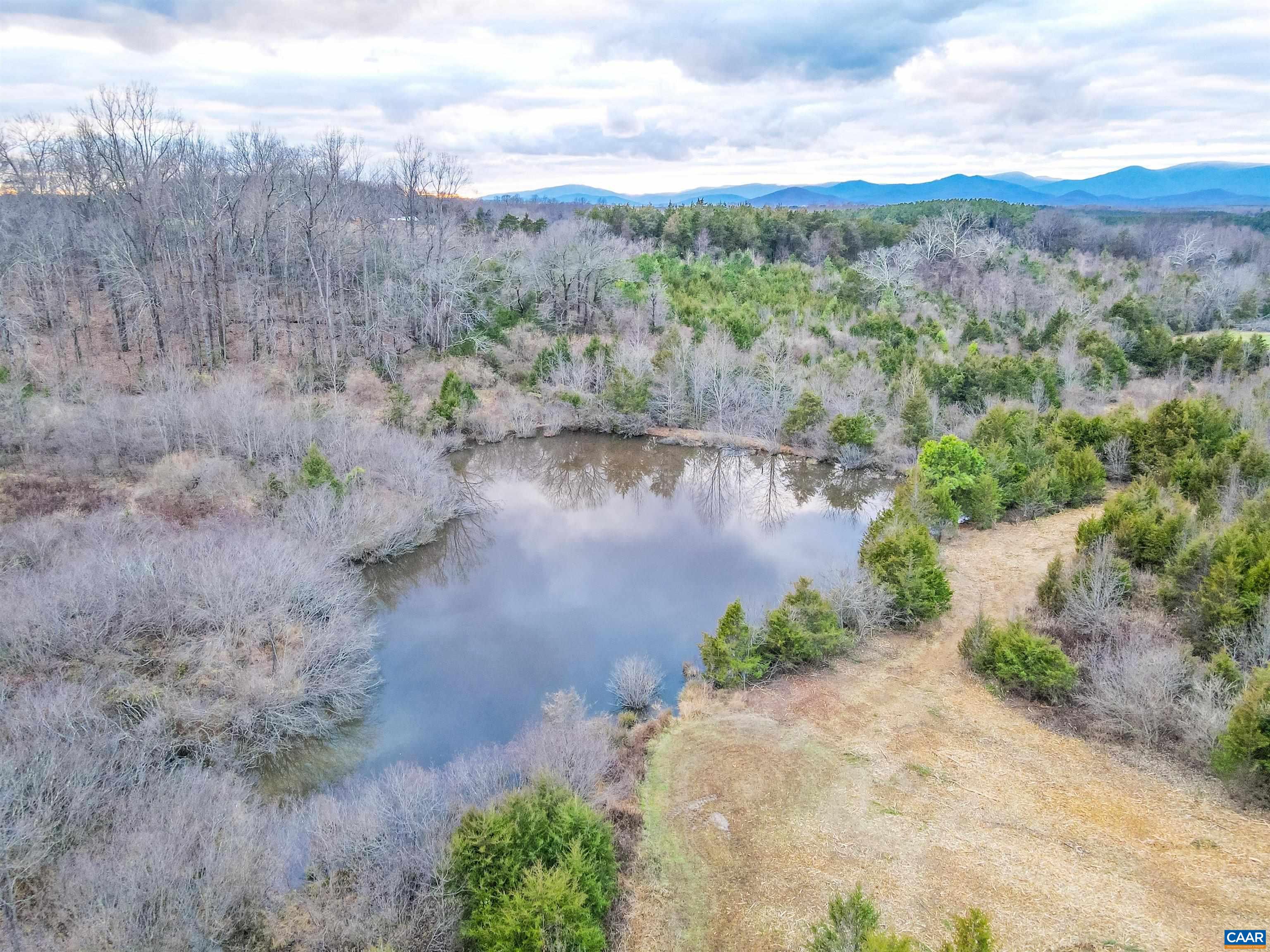 3 Welsh Run Road Ruckersville, VA 22968 - Photo 1 of 38 a view of a lake with mountain