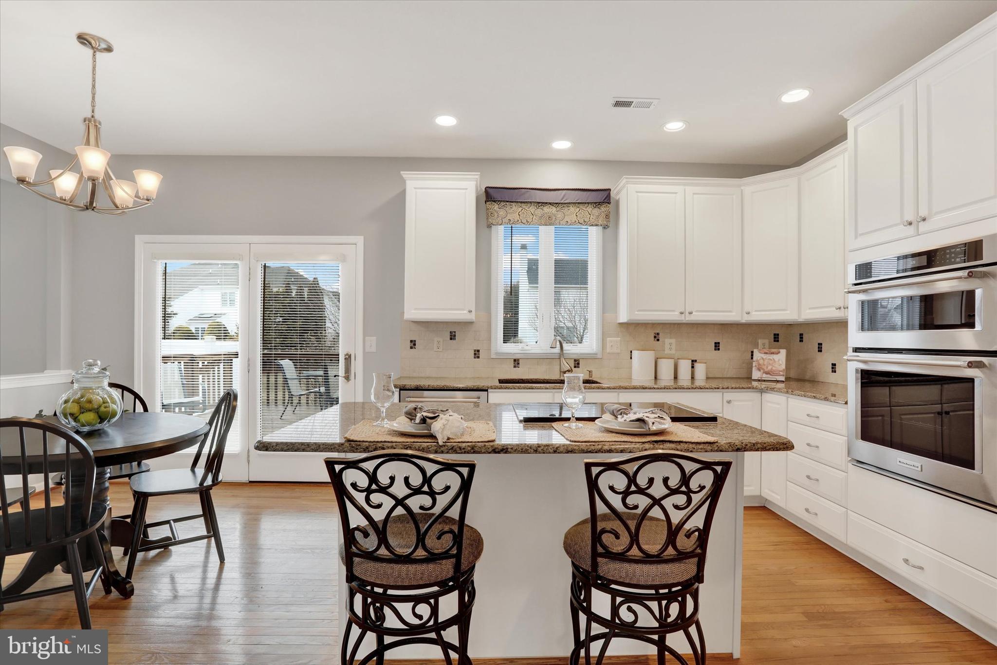 4960 Redfield Road Doylestown, PA 18902 - Photo 23 of 63 Kitchen Featuring The Island & Door To Deck/Patio