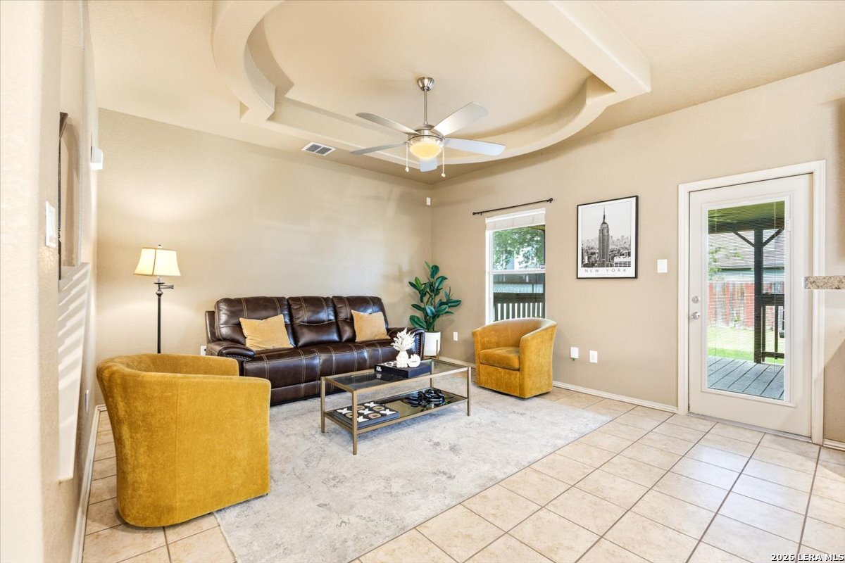 3831 Bacall Way Converse, TX 78109 - Photo 14 of 33 a living room with furniture and a chandelier