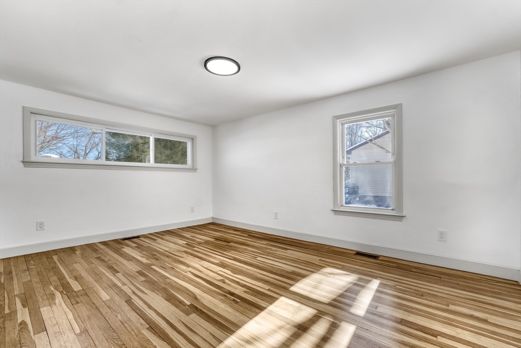 6 Spring Lane Saugus, MA 01906 - Photo 23 of 37 a view of a room with wooden floor and window